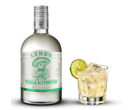 Lyre's Tequila Alternative bottle and lime cocktail